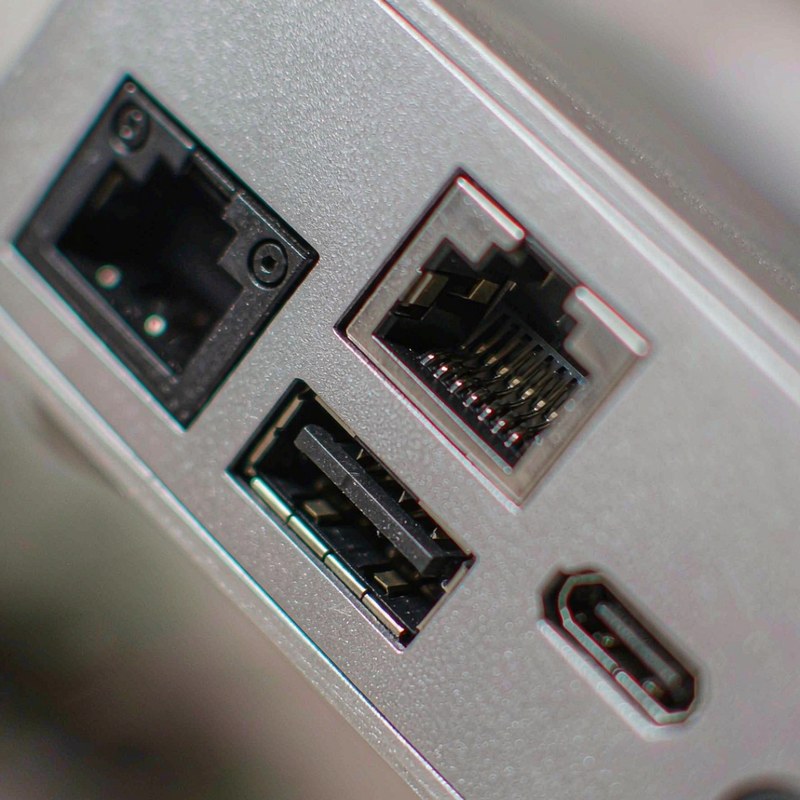 The rear I/O of the ACEMAGIC micro PC: two HDMI ports, Ethernet, USB-C and a power connector.