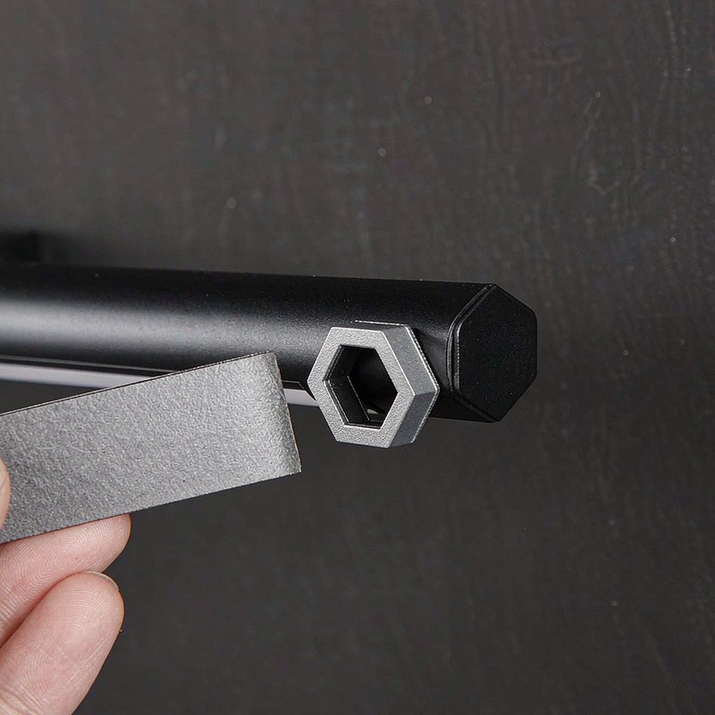 The linking connector and adhesive mounting plate on the back of a Lines bar.